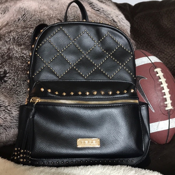 bebe Handbags - 🔆like new🔆Bebe leather backpack with gold studs